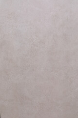 Fototapeta premium Textured wall surface with subtle pattern in soft neutral tones enhances contemporary interior design aesthetics