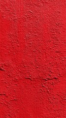 Textured red wall surface with rough plaster and vertical orientation