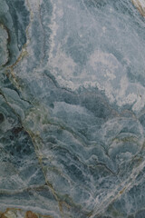 Natural blue stone surface with intricate patterns found in a geological formation