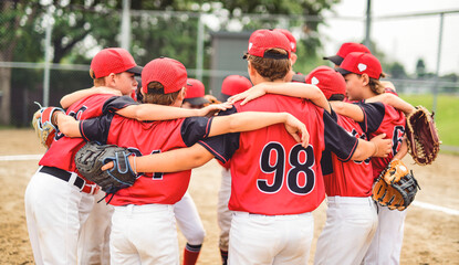 Group of baseball players standing together on the playground