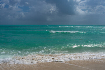 Refreshing sea beach breeze. Bright sea beach sunlight. Dreamy sea beach scenery. Stunning sea beach wallpaper. Peaceful ocean retreat. Ocean vibes. Sparkling ocean water. Tranquil ocean atmosphere.