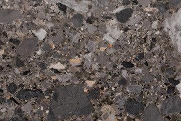Beautiful gray terrazzo flooring showcasing a mix of stones and textures in a modern interior space