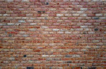 Brick wall made with bricks. Old red brick wall, masonry wall, stonework. Bric kwall background texture. Textured background of brickwall. Clinker brick.