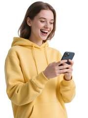 Young woman in a yellow sweatshirt is looking at her phone with transparent background.