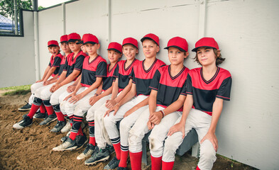 Group of baseball players standing together on the playground