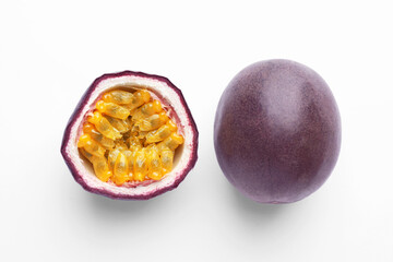 Fresh passion fruits on white background, above view. Whole and cut
