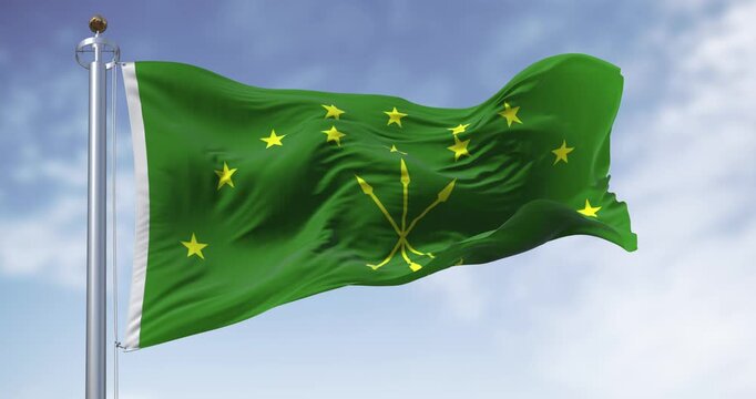 The Circassian flag waving in the wind on a clear day