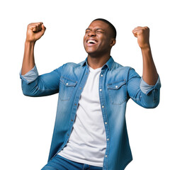 Joyful young black man celebrating success with arms raised in triumph outdoors