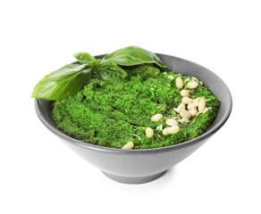 Fresh pesto sauce in bowl isolated on white