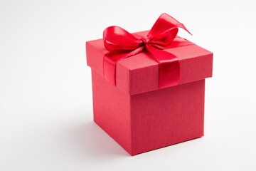 Obraz premium A red box with a red ribbon on top. gift box, Christmas concept.