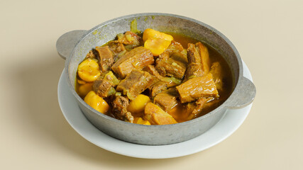 Beef stew in metal pot