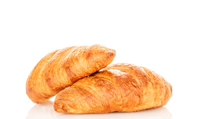 Chocolate croissants isolated on white background, close-up.