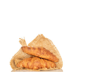 Chocolate croissants isolated on white background, close-up.