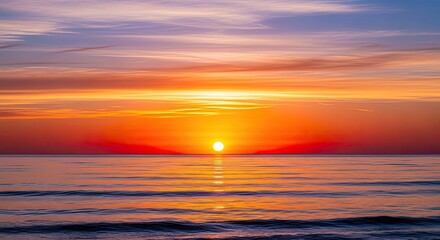 Golden Sunset Over Calm Ocean Waves with Vibrant Sky Reflected on Water