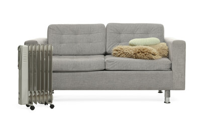 Soft sofa, electric heater and other used stuff isolated on white