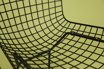 Stylish chair on olive background, closeup. Used stuff