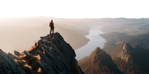 Traveler standing on picturesque rocky mountain peak, isolated on transparent cutout background