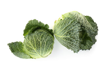 Fresh ripe Savoy cabbages isolated on white, top view