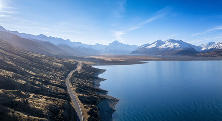 Aerial view of the highway to Mt. Cook along Lake Pukaki in South Island of New Zealand on a clear day