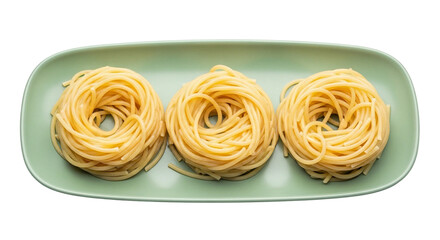 Three nests of spaghetti on a pale green plate