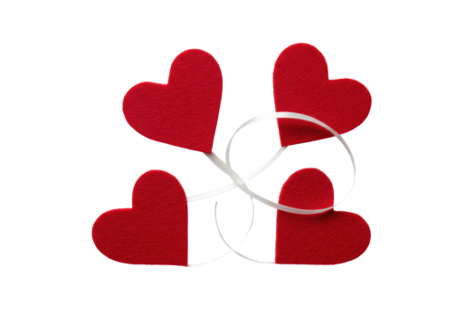 Three crimson felt hearts, soft texture, pearlized white ribbon intertwined, minimalist triangular arrangement on transparent, studio lit, elegant premium product concept