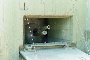 Minsk region, Belarus, July 12, 2025. Embrasure of a concrete pillbox on the Stalin Line.                               