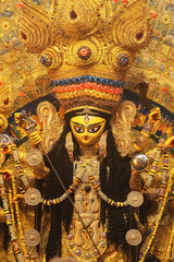 dazzling display of artistic decoration and creativity in idol of Hindu Goddess Durga, being...