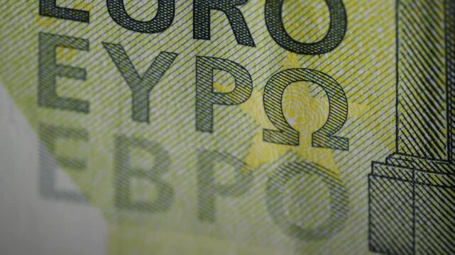 Macro details of 100 euro banknote in slow slider move