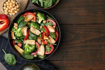 Tasty salad with eryngium mushrooms served on wooden table, flat lay. Space for text