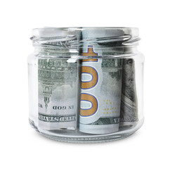 Glass jar with money isolated on white