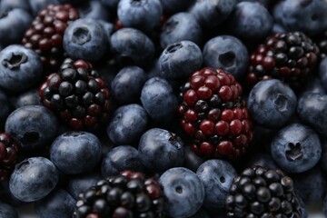 Different ripe juicy berries as background, closeup