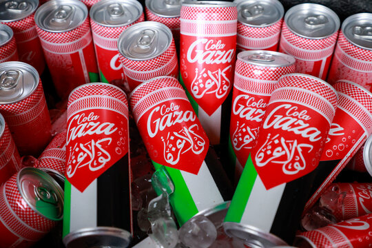Bologna, ITALY - September 09 2025: Cans of GAZACOLA, on ice