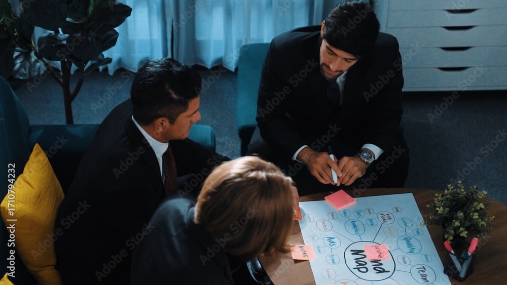 Poster Top view of skilled businessman write marketing idea and drawing mind map while project manager explain financial strategy at meeting room. Professional startup team brainstorm idea. Directorate.