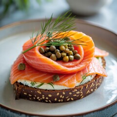 Delicious openfaced sandwich with smoked salmon, cream cheese, capers, and dill on a plate, showcasing a culinary delight and fresh ingredients