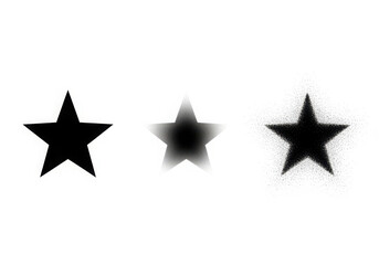 Obraz premium Three black stars on a white background with varying focus