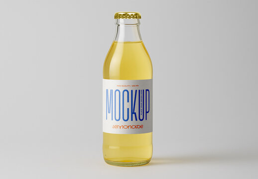 Clear Glass Bottle with Yellow Lemonade Drink Packaging Label Mockup