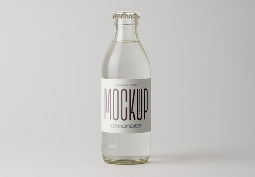 Clear Glass Bottle with Transparent Lemonade Beverage Label Mockup