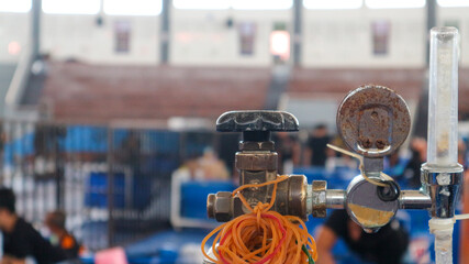 The oxygen cylinder is used to deliver oxygen through pipes and hoses.