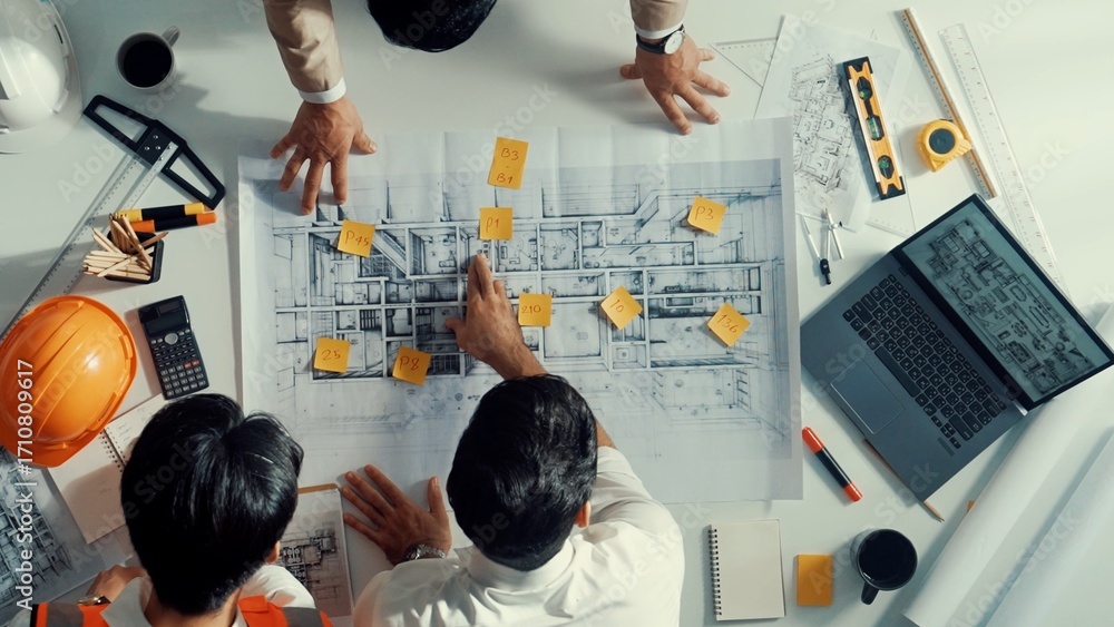 Poster top down aerial view of smart architect engineer team walking at meeting table while prepare for mee