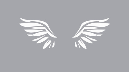 Pair of stylized white angel wings against a muted gray background.