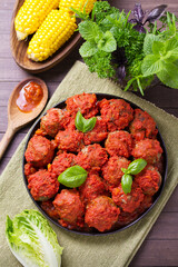Juicy pan seared beef meatballs with tomato sauce. View from above, top studio shot