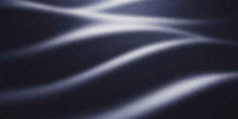 Abstract dark background with flowing, luminous white waves creating a sense of gentle movement and elegance