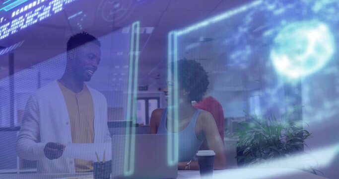 Collaborating coworkers analyzing holographic code interface in office with laptop, copy space