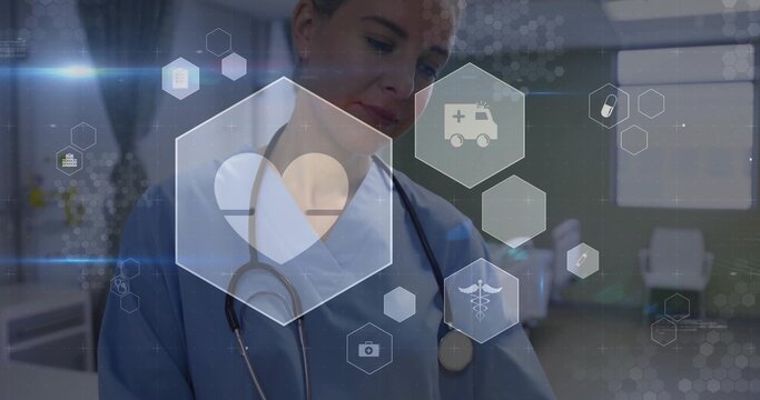 Standing nurse wearing scrubs and stethoscope in clinic room showing hexagonal medical icons - Powered by Adobe