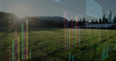 Obraz premium Overlaying bar charts and data panels over crop field, barn, evergreen trees, hills under low sun