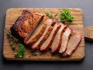 Smoked Beef Brisket Slices on Wooden Board