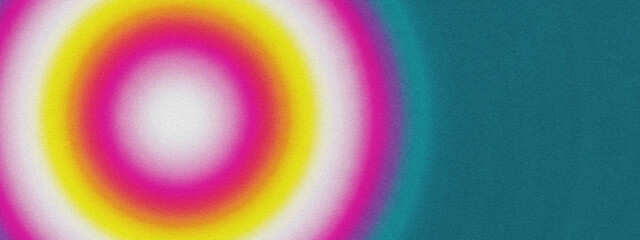 Concentric circles of vibrant pink, yellow, and white radiating outwards from a central point, transitioning to a teal blue on the right side
