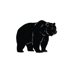 A powerful black bear stands alert captured in striking outline silhouette