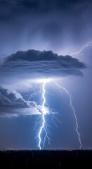 A dramatic lightning storm illuminates a dark sky above a silhouetted horizon.