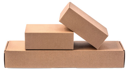 Three closed cardboard boxes stacked on transparent background